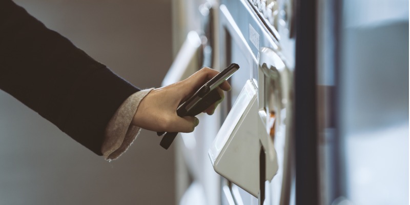 Woman Buying With A Vending Machine Picture Id890380260 (1)